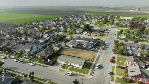 Fototapeta Naklejka Na Ścianę i Meble -  Aerial view of the tiny community of Spreckels.  In the heart of the Salinas Valley.  Well kept houses in a proud community