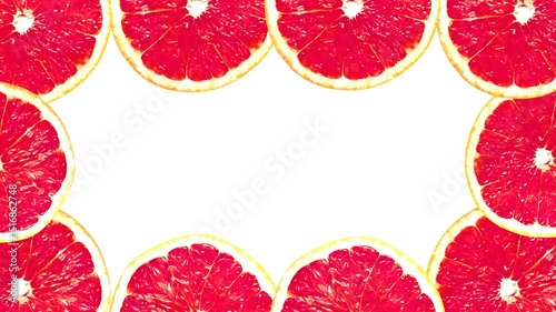 Abstract Grapefruit Slices Rotating Seamless Animation On Yellow Background 4k