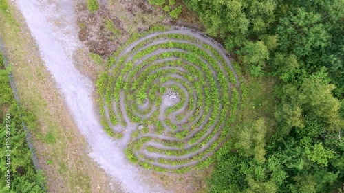 Drone view of a nature park and the labyrinth in Osnabrueck, Germany (Rundwanderweg Piesberg Nord)