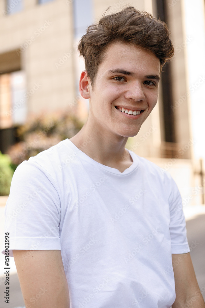 Handsome young hipster stylish man in white shirt, black pants Handsome young hipster stylish man in white shirt, black pants