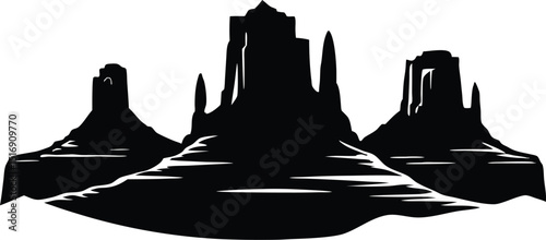 Silhouette of Desert Buttes, Iconic Desert Rock Formations at Dusk