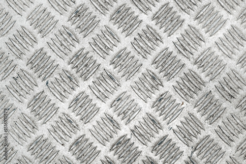 Anti slip gray metal diamond pattern surface texture as background