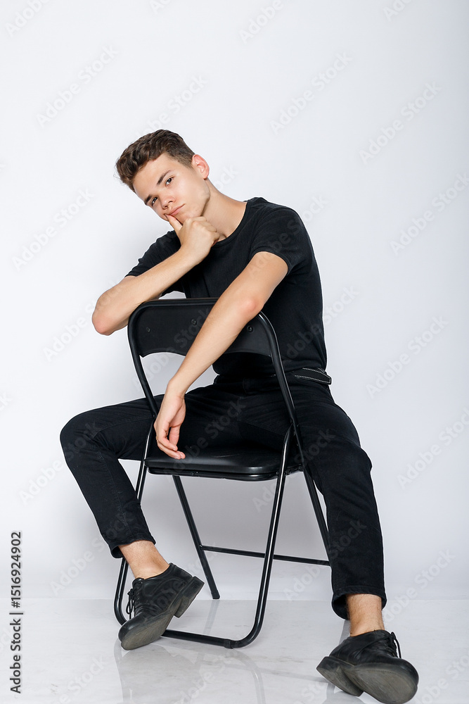 Man wearing black t-shirt Man wearing black t-shirt