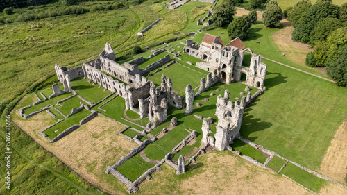 Aerial View of Ancient Stone Ruins of Castle Acre Priory in Green Fields