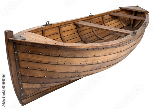 A rustic wooden boat, likely an antique rowboat, with visible planks and numerous metal rivets or bolts securing its construction. The boat has a simple design with a flat seat across its width.