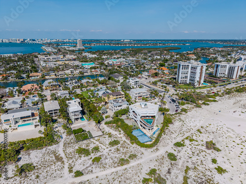 Beautiful aerial view of Sarasota, the magnificent white sand beach, and its iconic St. Armands Circle photo