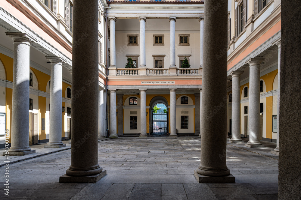 Fototapeta premium Lugano. Switzerland. Beige Yellow Walls with Arched Windows and Columns.