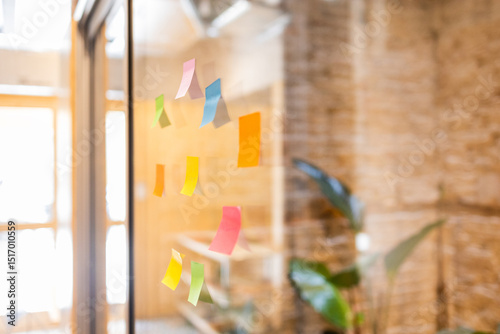 Colorful sticky notes in modern coworking space