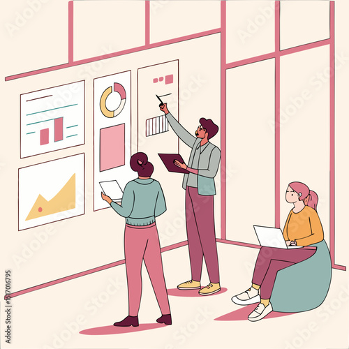 Team members collaborating and analyzing data charts in a modern office environment setup