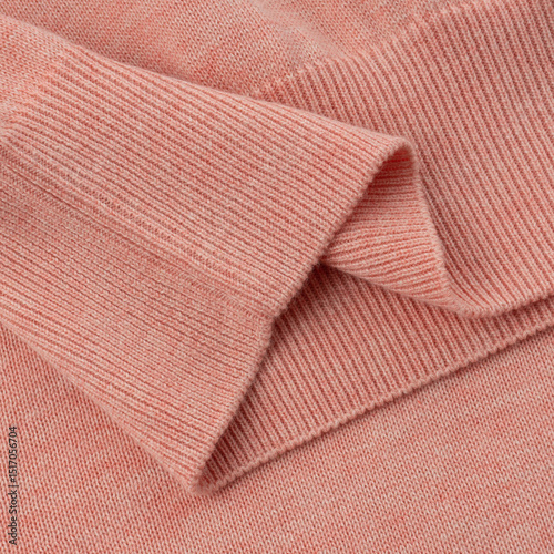 Elastic band of a light salmon pink knitted cotton polo t-shirt