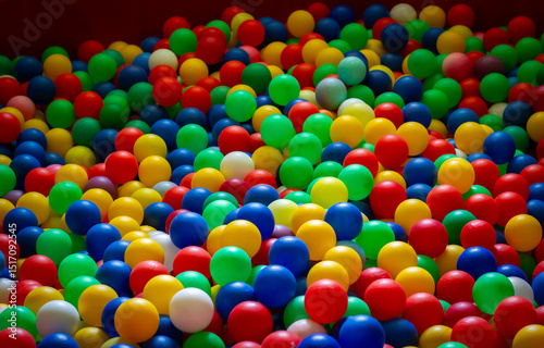 Plastic balls of white, yellow, red, green and blue colors