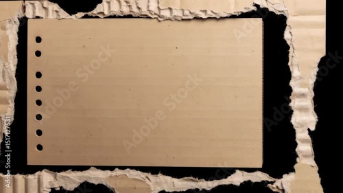 Brown cardboard frame with torn edges on a black background, textured paperboard surround with visible corrugation and a blank sheet with holes