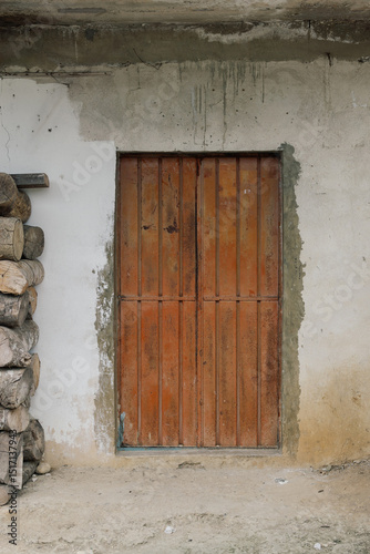 Rustic wooden door in a village