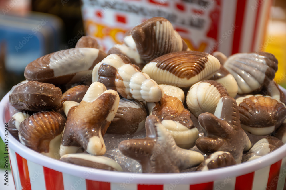 Fototapeta premium Famous Belgian chocolate candies on display in confectionery shop in Bruges, Belgium