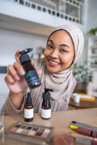Beauty influencer showing new product to audience