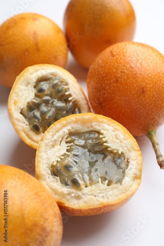 Fototapeta Naklejka Na Ścianę i Meble -  Ripe passion fruits on white background, closeup