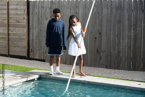 Cleaning the pool before we get in photo