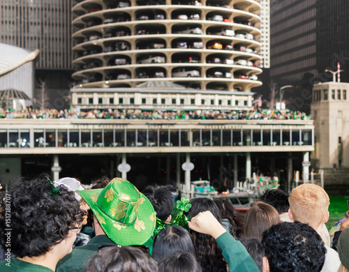 Anonymous flash lit group in Chicago on St Patrick's Day photo
