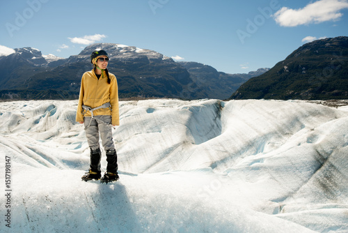Adventurer Treks Across Majestic Glacier Landscape
