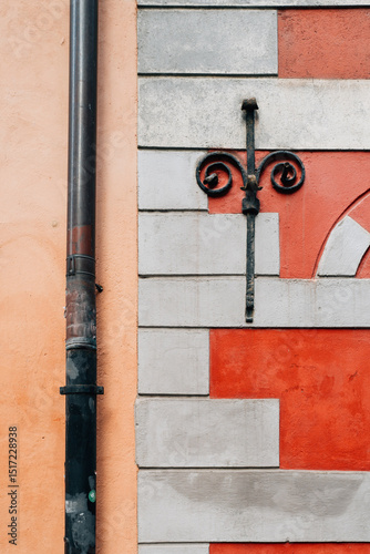 Detail of wall in Stockholm with elaborate ironwork photo