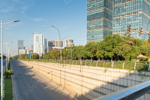 Fototapeta Naklejka Na Ścianę i Meble -  Empty urban road and buildings in the city