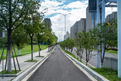 Fototapeta Naklejka Na Ścianę i Meble -  Empty urban road and buildings in the city