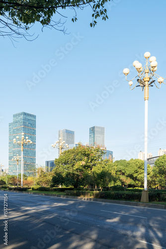 Fototapeta Naklejka Na Ścianę i Meble -  Empty urban road and buildings in the city