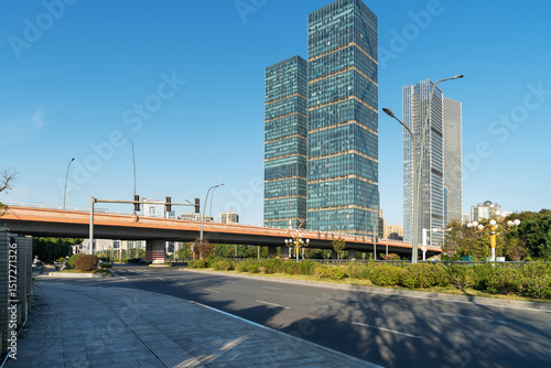 Fototapeta Naklejka Na Ścianę i Meble -  Empty urban road and buildings in the city