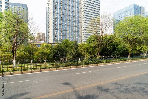 Fototapeta Naklejka Na Ścianę i Meble -  Empty urban road and buildings in the city