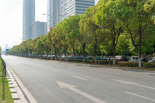 Fototapeta Naklejka Na Ścianę i Meble -  Empty urban road and buildings in the city