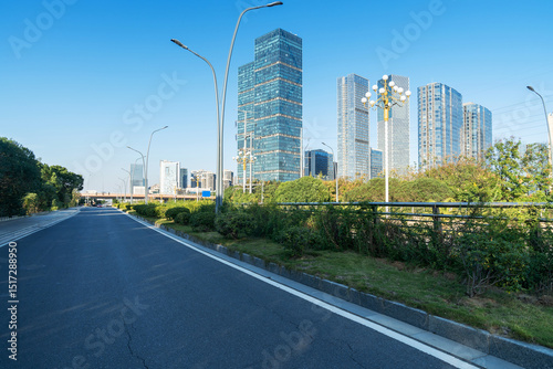 Fototapeta Naklejka Na Ścianę i Meble -  Empty urban road and buildings in the city