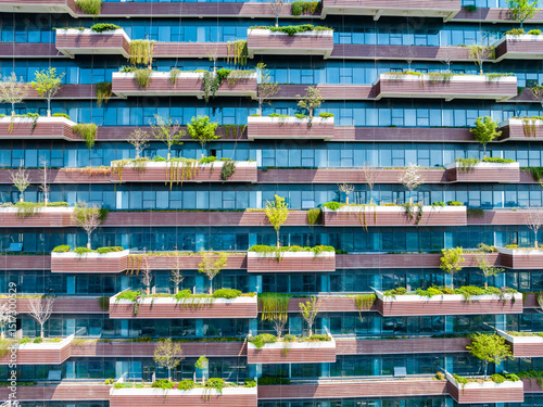 Aerial View of Building with Trees Planted Outside Windows photo
