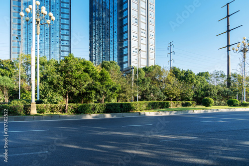 Fototapeta Naklejka Na Ścianę i Meble -  Empty urban road and buildings in the city