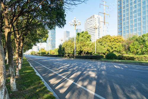 Fototapeta Naklejka Na Ścianę i Meble -  Empty urban road and buildings in the city