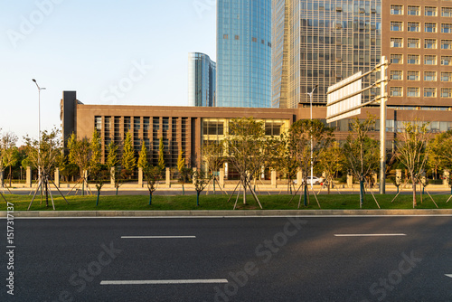 Fototapeta Naklejka Na Ścianę i Meble -  Empty urban road and buildings in the city