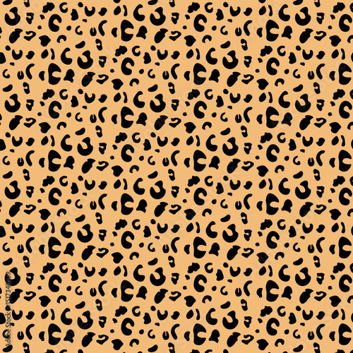 A golden tan backdrop with classic black spots. Evokes wild savanna style, ideal for trendy decor.