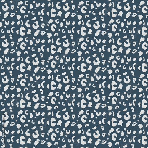 Moody and dramatic leopard pattern with stormy blue background and pale gray spots. Ideal for bold branding, editorial layouts, or modern packaging.