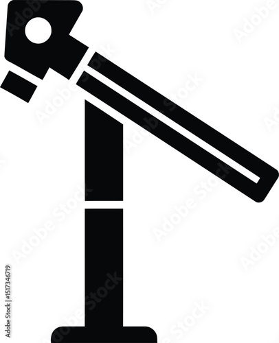 Vector illustration of a dental chair and headlamp in minimalist black and white silhouette perfect for medical and healthcare concepts