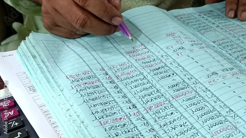 Traditional Accounting in the Digital Age: Bangladeshi NGO Officer Handwriting Financial Records