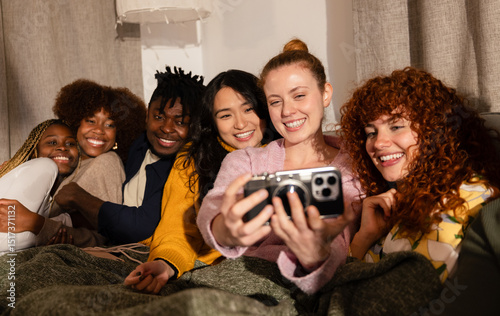 Friends enjoying a cozy group selfie together
