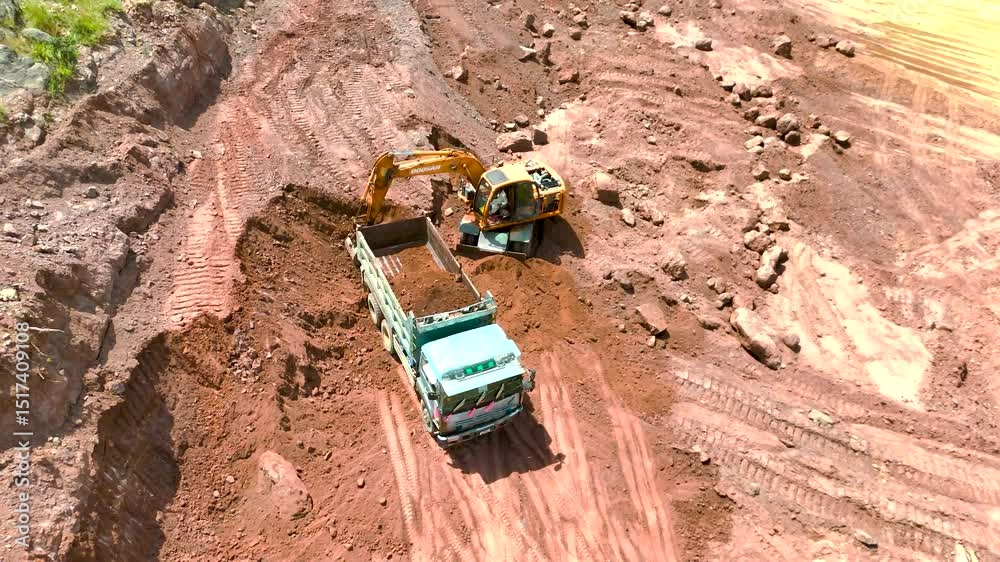 Excavator Loading Dumper – Heavy Construction Equipment in Action