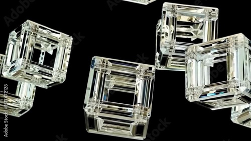 Floating abstract cubes made of glass and metal spinning gently