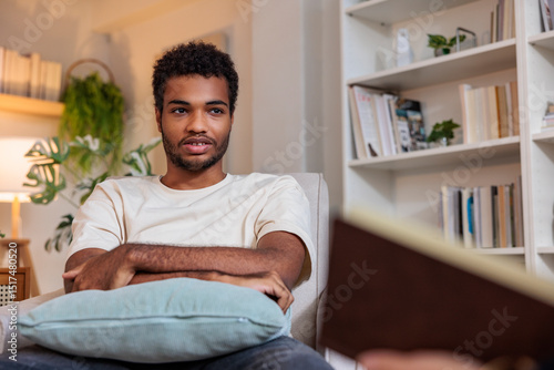 Young man listening during counseling photo
