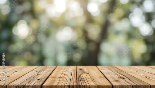 empty wooden table on blurred natural background