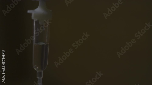 Closeup Of IV Drip In Hospital, Video footage for medical and cinematic in eye scene.
