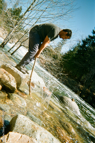 35mm film playing river photo