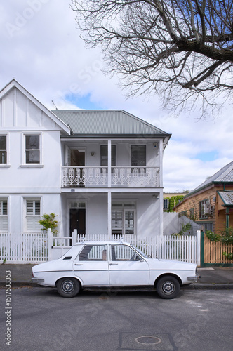 Two Story White House with Gabled Roof in Fitzroy, Melbourne photo