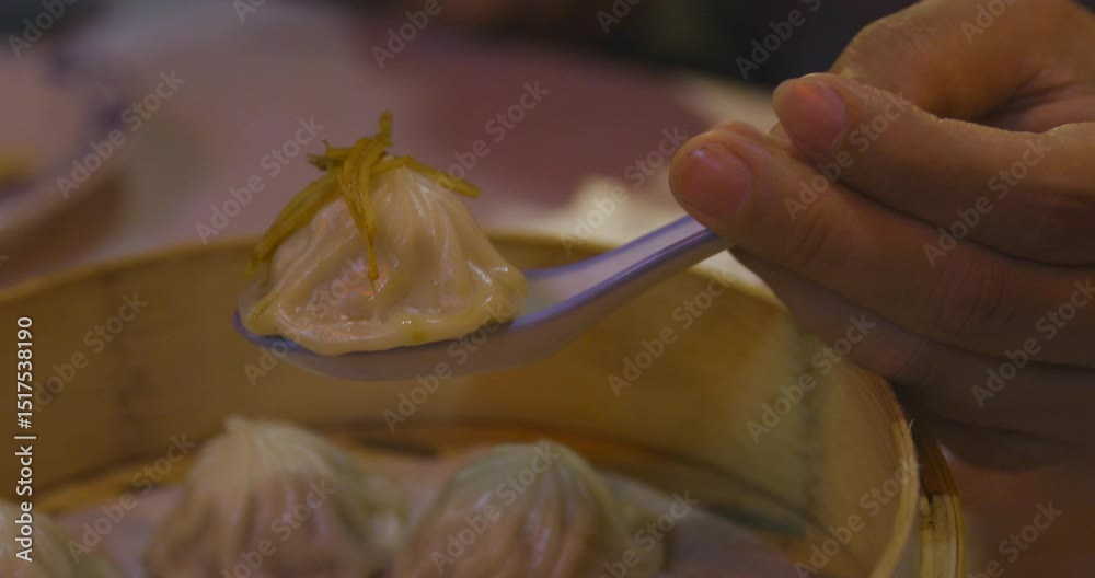 custom made wallpaper toronto digitalXiao long bao in the steamer basket with chopsticks at dinner handheld shot