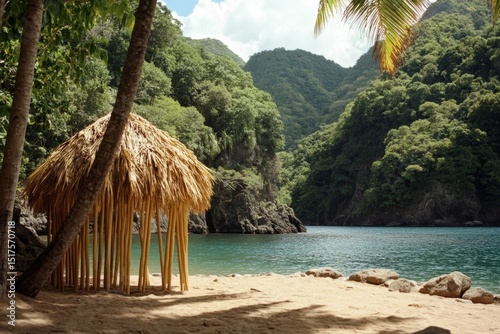 Tropical beach with thatched hut surrounded by lush mountains and clear blue water in a serene coastal location