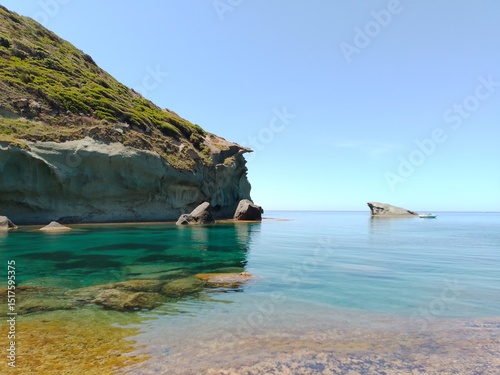 Fototapeta Naklejka Na Ścianę i Meble -  Cala 'e Moro cove in Bosa, Sardinia, in the Mediterranean Sea in summer